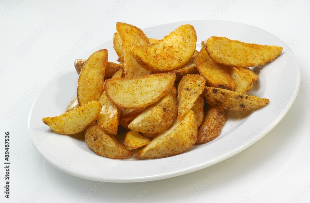 Potato wedges on plate Potato wedges on plate