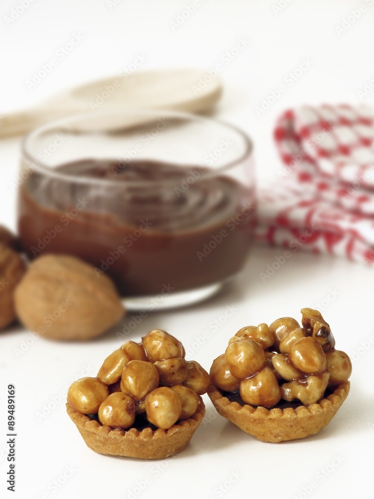 Fototapeta premium Nut tartlets and nougat cream