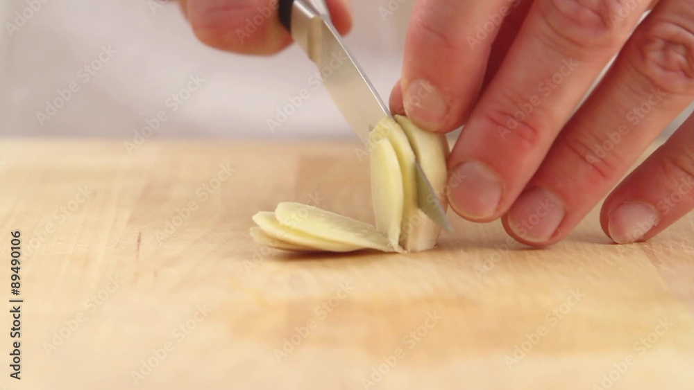 Ginger being sliced Ginger being sliced
