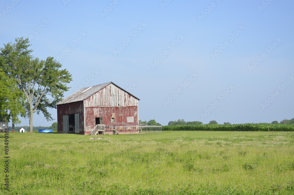Weathered outbuilding on a rural farm Weathered outbuilding on a rural farm
