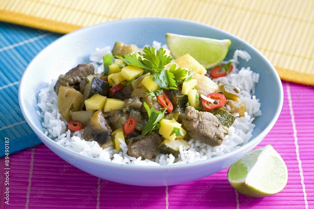 Pork with mango, vegetables and chilli on a bed of rice (Caribbean)
