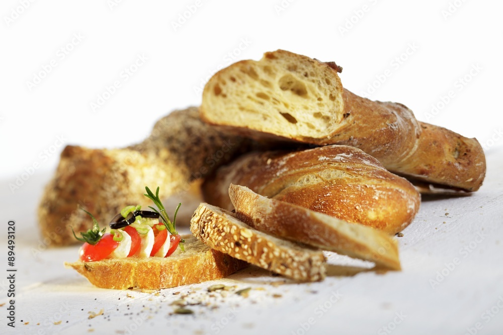 Bread topped with tomato and mozzarella Bread topped with tomato and mozzarella
