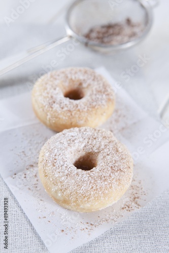 Two doughnuts with cinnamon sugar
