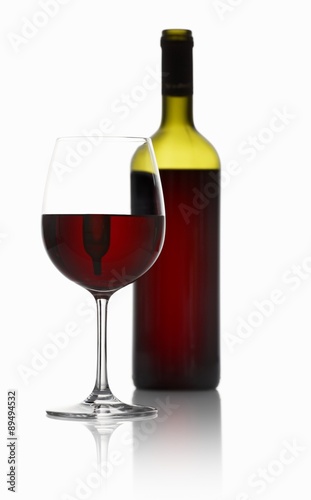 Red wine in a bottle and a glass