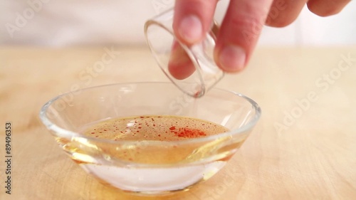 Saffron being dissolved in warm water