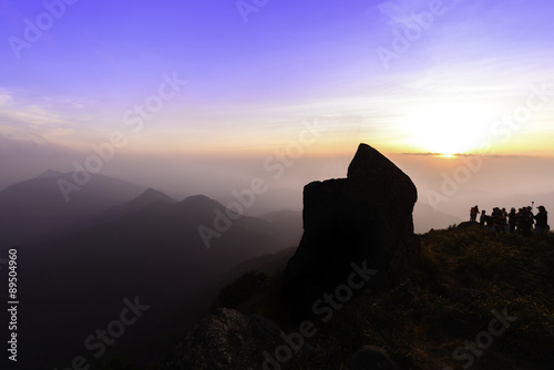 Traveller standing on peak of Mokoju mountain, Kamphaeng Phet, T photo