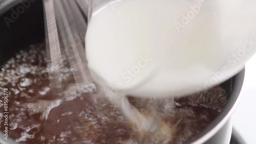 Gravy being thickened with cornflour