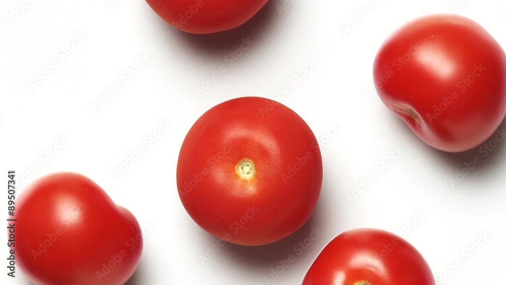 Five tomatoes on a rotating plate Five tomatoes on a rotating plate