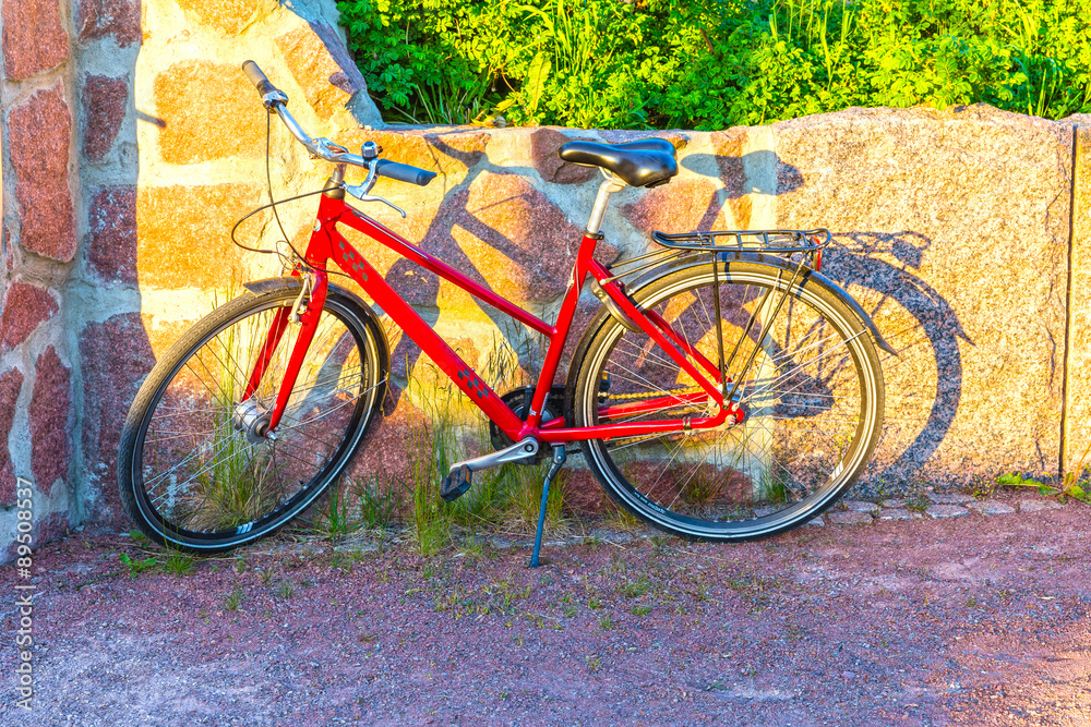 Bicycle stands near wall on the street in in Mariehamn, Aland islands, Finland