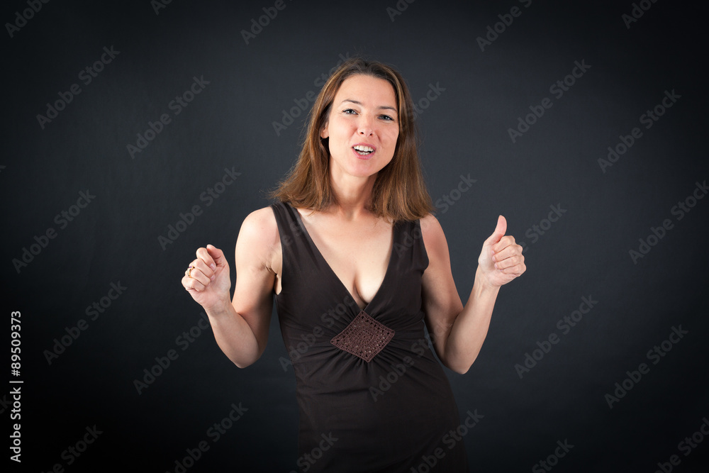 Beautiful woman doing different expressions in different sets of clothes: arms raised Beautiful woman doing different expressions in different sets of clothes: arms raised