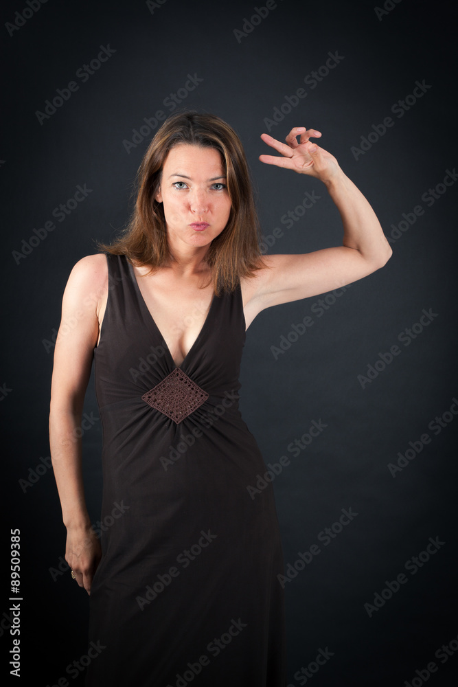 Beautiful woman doing different expressions in different sets of clothes: you are crazy Beautiful woman doing different expressions in different sets of clothes: you are crazy