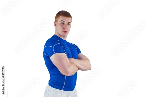 Portrait of a rugby player with arms crossed © WavebreakmediaMicro