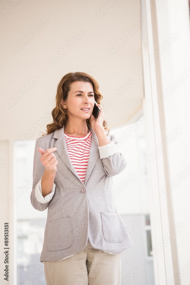 Casual businesswoman having a phone call Casual businesswoman having a phone call