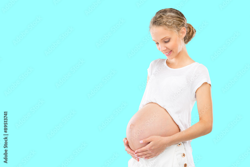 Pregnant woman on blue background Pregnant woman on blue background