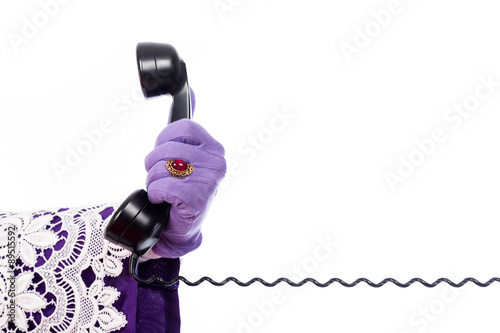 Hand of Sinterklaas with telephone photo