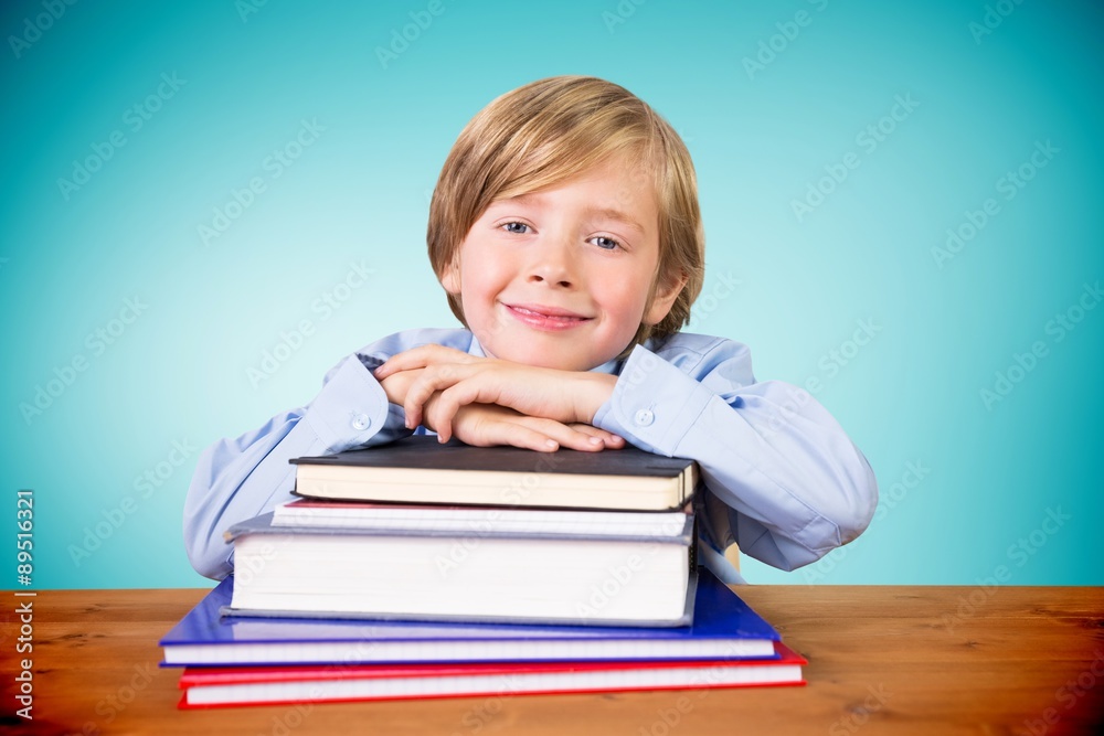 Composite image of cute pupil with books Composite image of cute pupil with books
