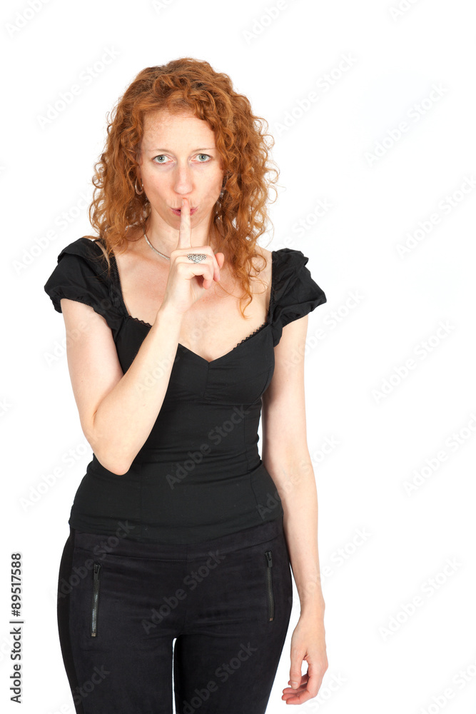 Beautiful woman doing different expressions in different sets of clothes: be quiet Beautiful woman doing different expressions in different sets of clothes: be quiet