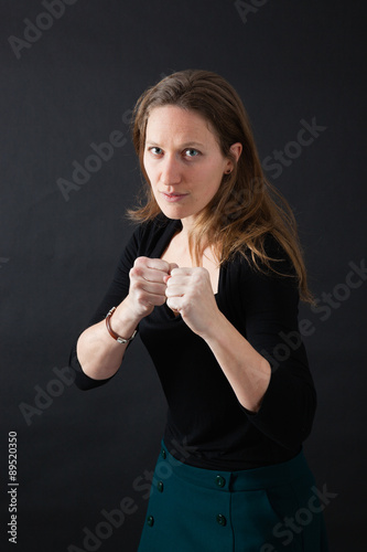 Beautiful woman doing different expressions in different sets of clothes: boxe