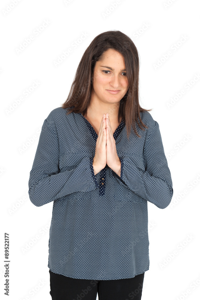 Beautiful women doing different expressions in different sets of clothes: prayer Beautiful women doing different expressions in different sets of clothes: prayer