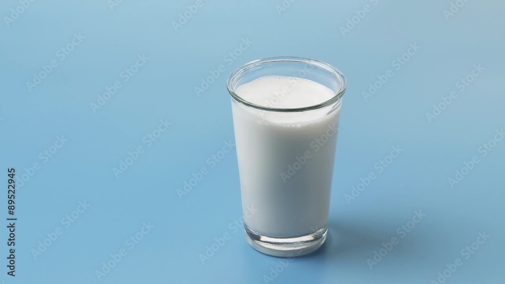 Pouring a glass of milk Pouring a glass of milk