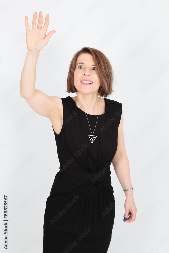 Beautiful woman doing different expressions in different sets of clothes: waving Beautiful woman doing different expressions in different sets of clothes: waving
