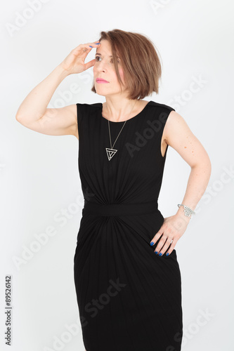 Beautiful woman doing different expressions in different sets of clothes: worried