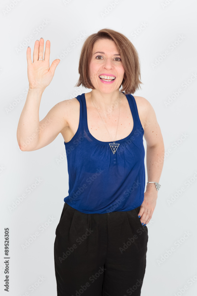 Beautiful woman doing different expressions in different sets of clothes: waving Beautiful woman doing different expressions in different sets of clothes: waving