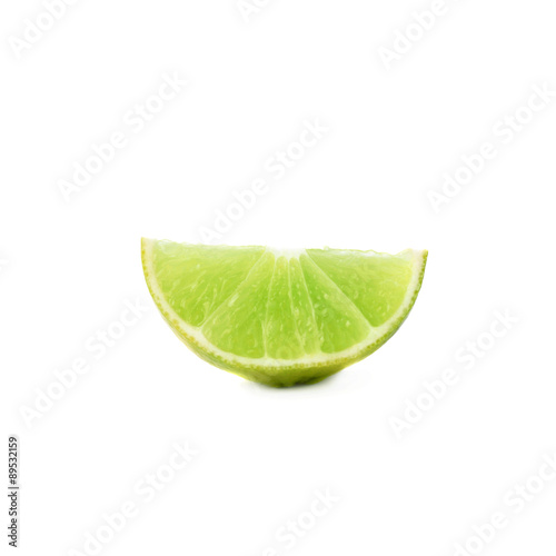 Slice section of lime isolated over the white background