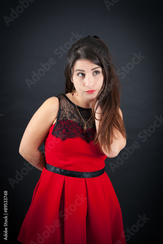 Beautiful woman doing different expressions in different sets of clothes: bored