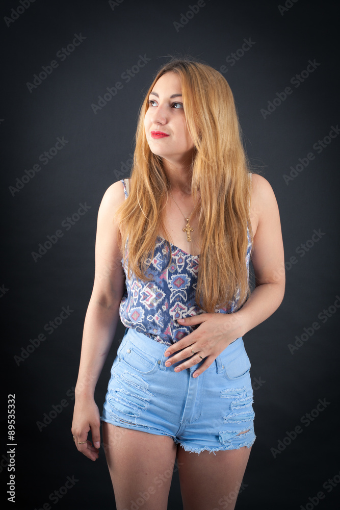 Beautiful girl doing different expressions in different sets of clothes: hungry Beautiful girl doing different expressions in different sets of clothes: hungry