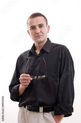 Portrait of man in black shirt on a white background