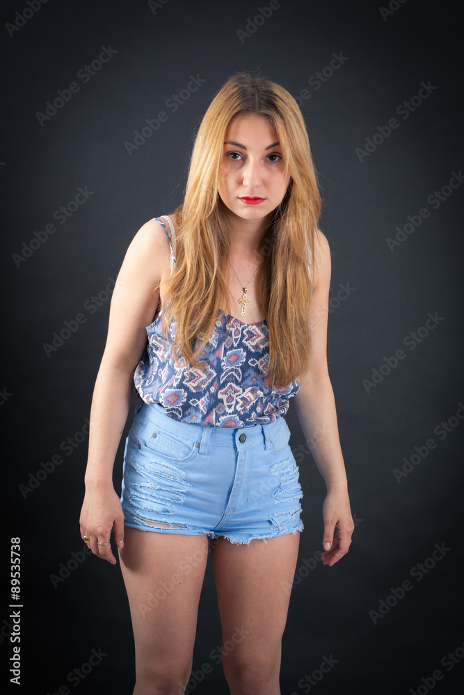 Beautiful girl doing different expressions in different sets of clothes: surprise Beautiful girl doing different expressions in different sets of clothes: surprise