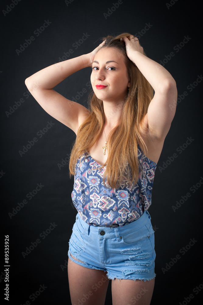 Beautiful girl doing different expressions in different sets of clothes: posing Beautiful girl doing different expressions in different sets of clothes: posing