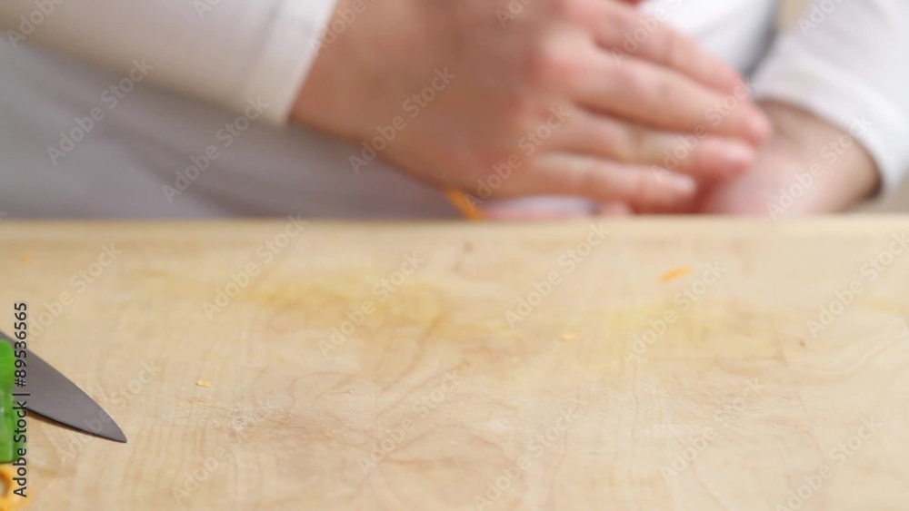 Man chopping leek, close-up Man chopping leek, close-up