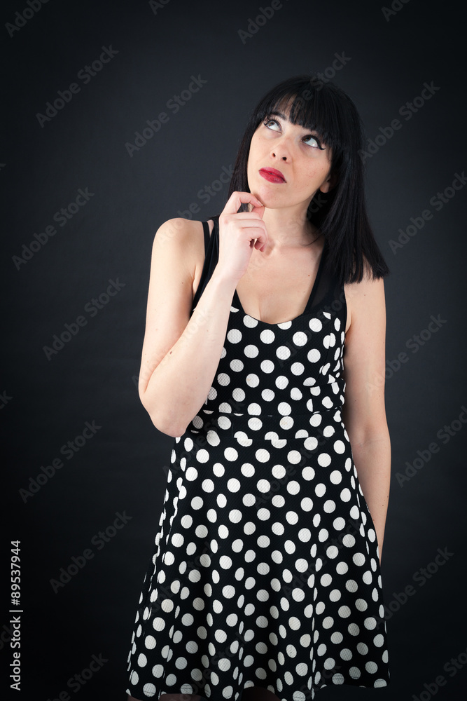 Beautiful woman doing different expressions in different sets of clothes: thinking Beautiful woman doing different expressions in different sets of clothes: thinking