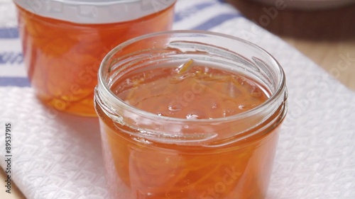 Orange marmalade in jars photo