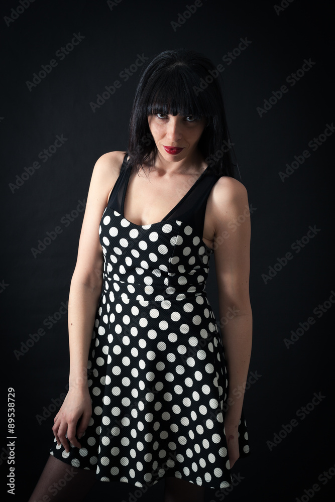 Beautiful woman doing different expressions in different sets of clothes: posing