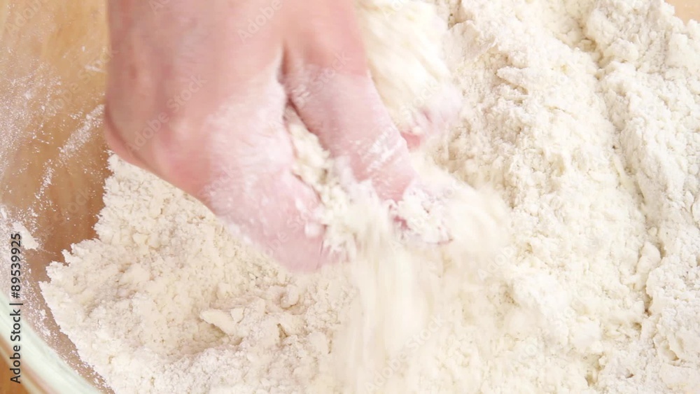 Flour and butter being mixed Flour and butter being mixed