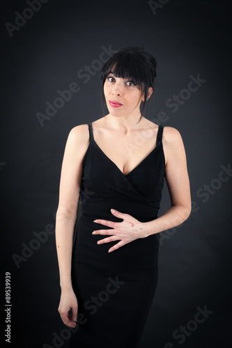 Beautiful woman doing different expressions in different sets of clothes: hungry