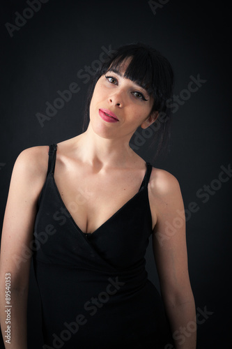 Beautiful woman doing different expressions in different sets of clothes:
