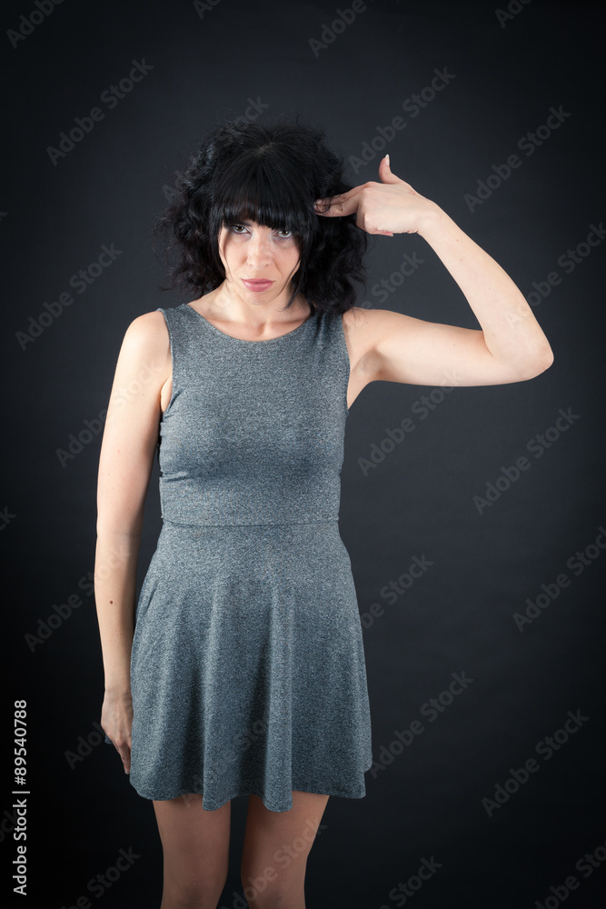 Beautiful woman doing different expressions in different sets of clothes: want to speak Beautiful woman doing different expressions in different sets of clothes: want to speak