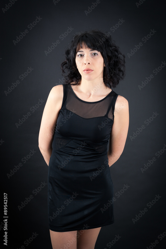 Beautiful woman doing different expressions in different sets of clothes: posing Beautiful woman doing different expressions in different sets of clothes: posing