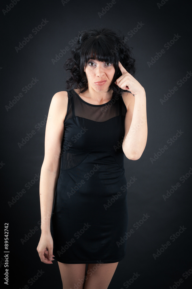 Beautiful woman doing different expressions in different sets of clothes: you are crazy Beautiful woman doing different expressions in different sets of clothes: you are crazy