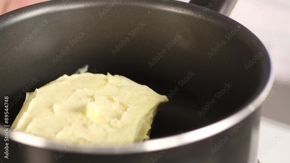 Butter being melted in a pot Butter being melted in a pot