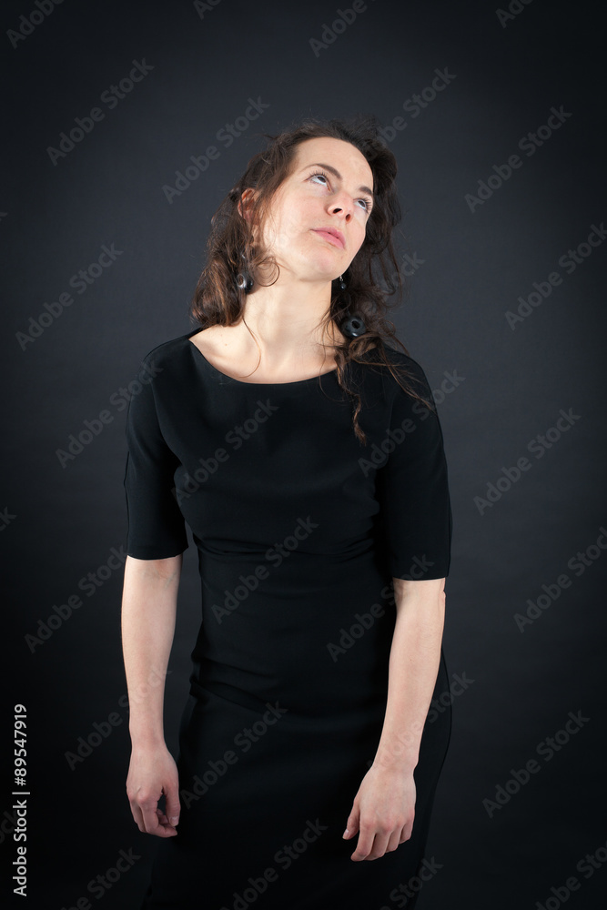 Beautiful woman doing different expressions in different sets of clothes: bored