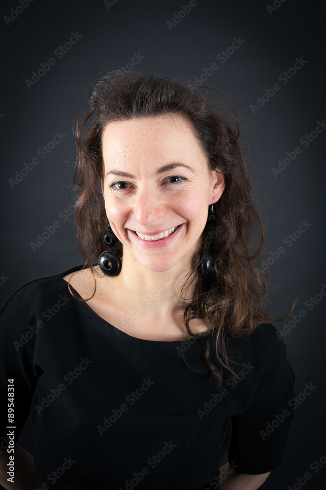 Beautiful woman doing different expressions in different sets of clothes: smile Beautiful woman doing different expressions in different sets of clothes: smile