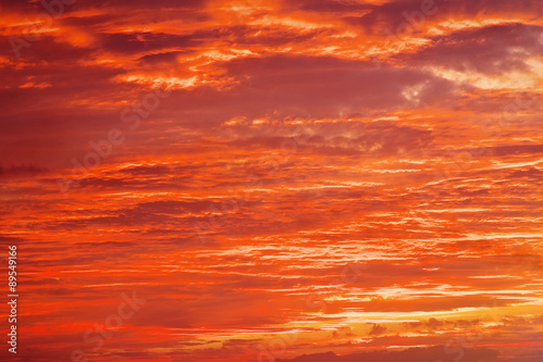 Fiery orange sunset sky. Beautiful sky background.