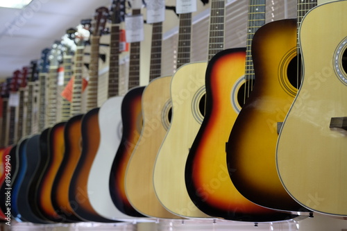 The image of guitars on a show-window of musical shop