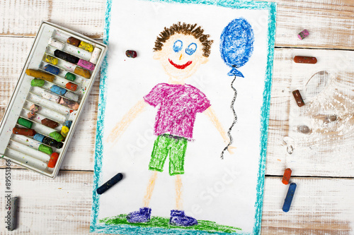 colorful drawing: happy boy with balloon