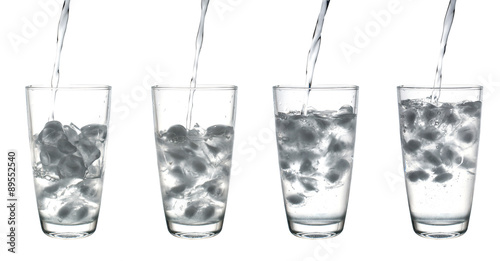 water pouring in glass isolated on white background, Clipping Pa